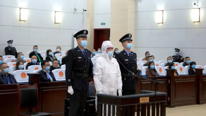 تانغ لو أثناء المحاكمة يوم 14 أكتوبر (وسائل إعلام صينية)