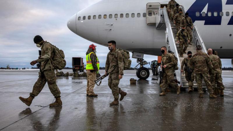 جنود أميركيون يعودون إلى بلادهم من أفغانستان في ديسمبر/كانون الأول الماضي. (غيتي)