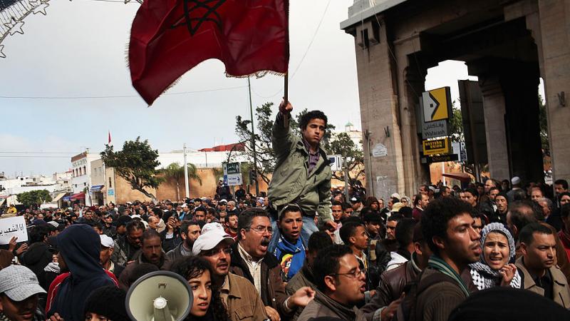مغاربة يُشاركون في حركة "20 فبراير". (غيتي)