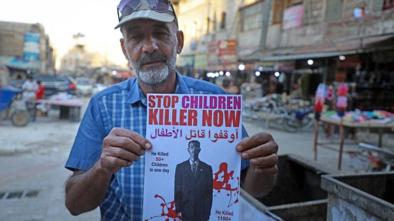 في إدلب، التي شهدت تظاهرات شعبية حاشدة ضد "مسرحية انتخابات الأسد"، وتأكيدًا على استمرار الثورة ضد نظام القتل والقمع (غيتي)