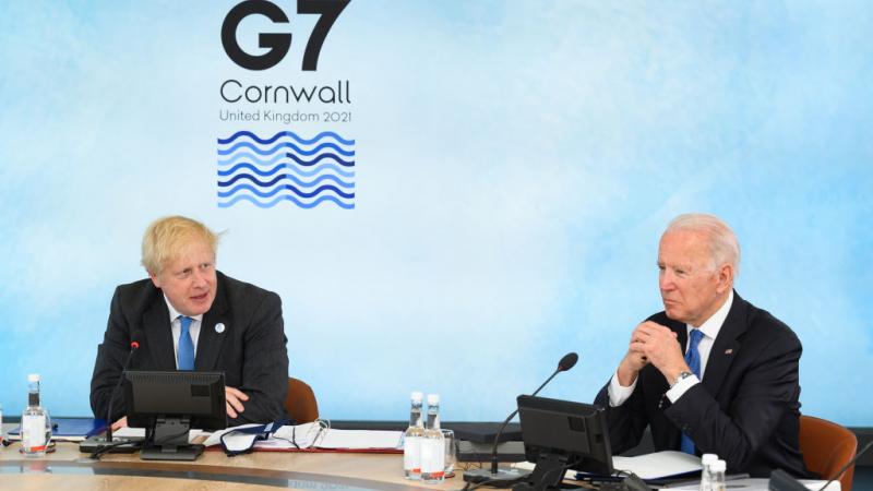 بوريس جونسون وجو بايدن في اجتماع مجموعة السبع يوم 11 يونيو 2021 (غيتي)