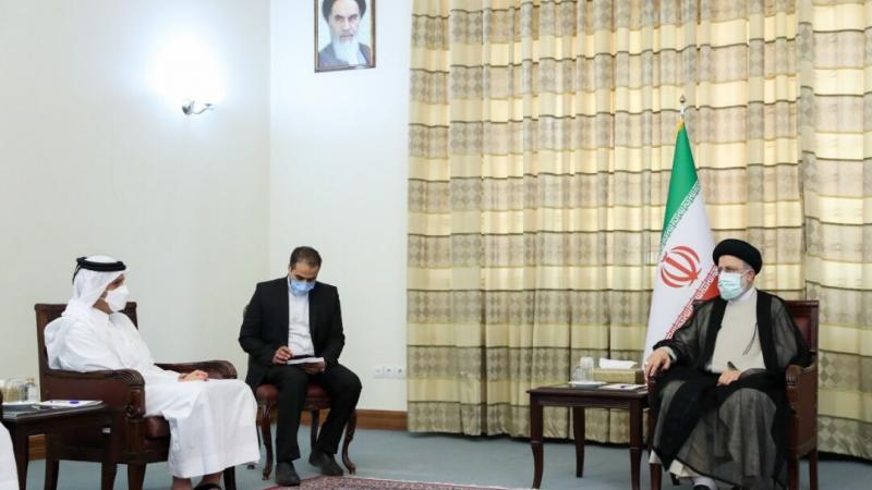 الرئيس الإيراني المنتخب إبراهيم رئيسي ووزير الخارجية القطري محمد بن عبد الرحمن آل ثاني في طهران
