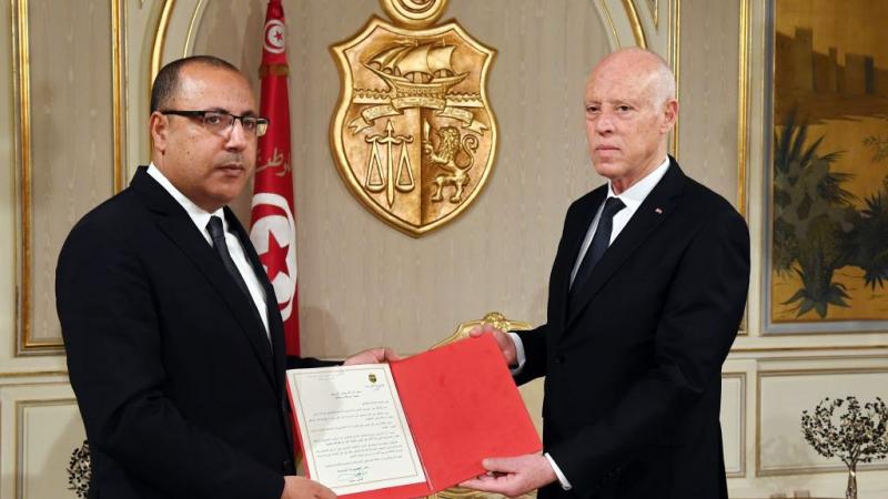 هشام المشيشي عند تعيينه رئيسًا للحكومة التونسية من قبل الرئيس قيس سعيّد