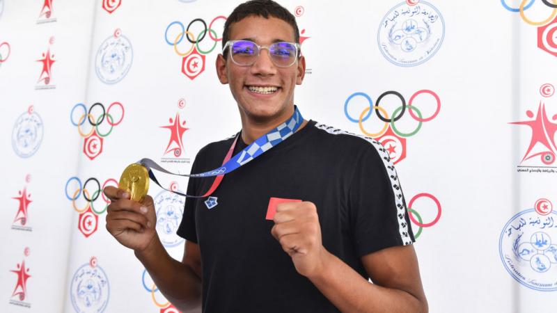 شكّل التونسي أحمد الحفناوي "مفاجأة" أولمبياد طوكيو 2020 بعد انتزاعه أول ميدالية ذهبية للعرب (غيتي)