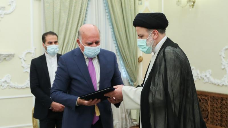 سلّم وزير الخارجية العراقي الرئيس الإيراني دعوة لحضور المؤتمر الإقليمي الذي تنظّمه بغداد (تويتر)